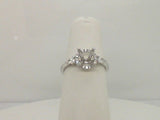 14Kt. White Gold 0.27Ctdw Natural Round And Pear Shaped Diamond Semi Mount For A 6.5mm Round Center Size 6.5