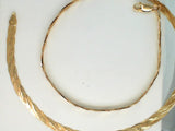 14kt. yellow gold 18" 4.5mm Triple Braided Polished Beveled Edge Herringbone neckchain