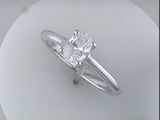Platinum Four Prong Cathedral Solitaire for a 7X5mm Oval Center Size 6.5