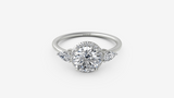 14Kt. White Gold 0.27Ctdw Natural Round And Pear Shaped Diamond Semi Mount For A 6.5mm Round Center Size 6.5