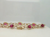 14kt. yellow gold Infinty link pear shaped genuine fine quality ruby and Diamond Bracelet