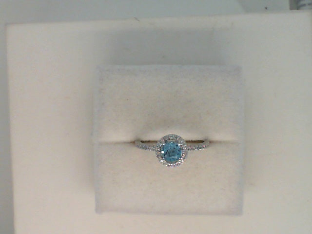 14kt. white gold Swiss Blue Topaz and Round Diamond Halo Ring