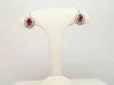 18KT. WHITE GOLD 2=1.23CTGW 0.49CTDW FINE NATURAL OVAL RUBY AND NATURAL ROUND DIAMOND EARRINGS